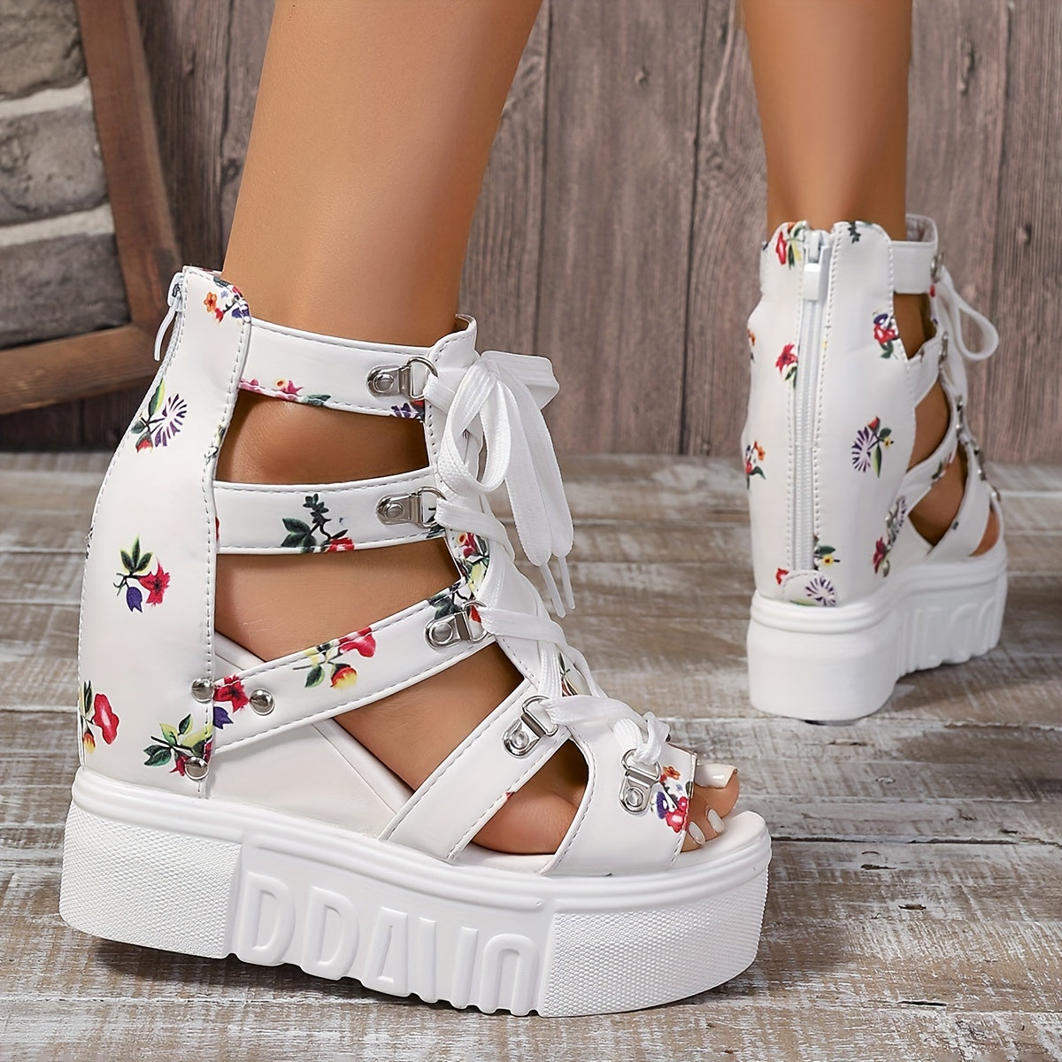 SPECIFICATIONS Closure: Zipper Heel Hight: High Heel Heel Type: Platform Heel Inner Material: EVA Insole Material: EVA Item ID: AE166916 Operation Instruction: Other Pattern: Flowers Sole Material: PU Toe Style: Open Toe Upper Material: EVA